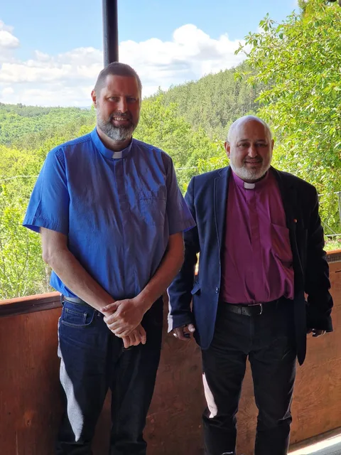 Ashley with a fellow member of the clergy