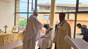 Bishop Seamus lays hands on Bishop Ashley Deutschmann during his Episcopal Ordination