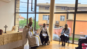 Bishop Ashley Deutschmann gives the homily after his Episcopal Ordination in Sofia