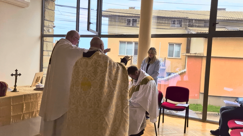 Bishops pray over Bishop Ashley Deutschmann during his Episcopal Consecration in Sofia
